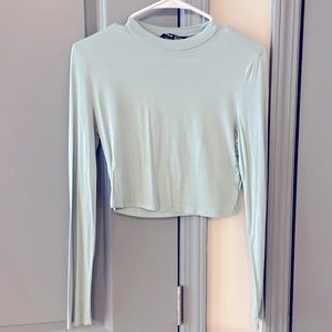 Slightly cropped light sage long sleeve top. Super cute, never worn
